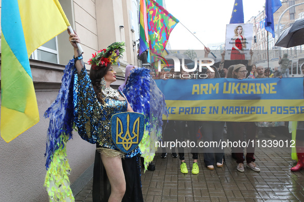 An activist is partaking in the Equality March organized by KyivPride NGO for the first time since the 2022 Russian invasion of Ukraine, in...