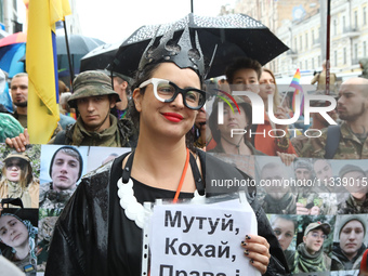 An activist in a costume is partaking in the Equality March organized by KyivPride NGO for the first time since the 2022 Russian invasion of...