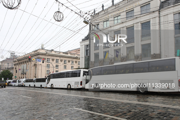 Police buses are parking along the street during the Equality March organized by KyivPride NGO for the first time since the 2022 Russian inv...