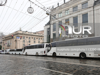 Police buses are parking along the street during the Equality March organized by KyivPride NGO for the first time since the 2022 Russian inv...