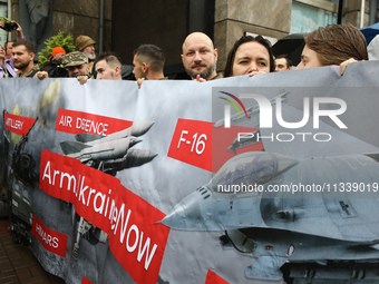 Activists in military uniforms are partaking in the Equality March organized by KyivPride NGO for the first time since the 2022 Russian inva...