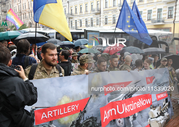 Activists in military uniforms are partaking in the Equality March organized by KyivPride NGO for the first time since the 2022 Russian inva...