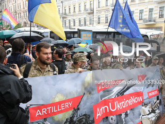 Activists in military uniforms are partaking in the Equality March organized by KyivPride NGO for the first time since the 2022 Russian inva...