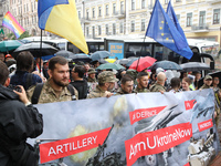 Activists in military uniforms are partaking in the Equality March organized by KyivPride NGO for the first time since the 2022 Russian inva...