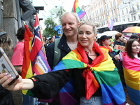 Demonstrators are taking a selfie during the Equality March organized by KyivPride NGO for the first time since the 2022 Russian invasion of...