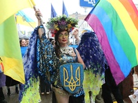 An activist is partaking in the Equality March organized by KyivPride NGO for the first time since the 2022 Russian invasion of Ukraine, in...