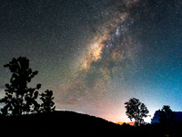 The Milky Way is being seen over the Tea Estate in Ratnapura, Sri Lanka, on June 17, 2024. The Milky Way is a huge collection of stars, dust...