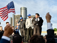 Members of America First, a far-right white Christian nationalist group, are holding a prayer while awaiting their leader Nick Fuentes to ar...