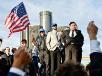 Members of America First, a far-right white Christian nationalist group, are holding a prayer while awaiting their leader Nick Fuentes to ar...