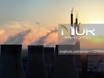 The Datang Electric Power Zhangjiakou Power Plant is being seen at sunset in Zhangjiakou, China, on June 17, 2024. (