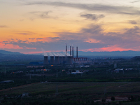 The Datang Electric Power Zhangjiakou Power Plant is being seen at sunset in Zhangjiakou, China, on June 17, 2024. (