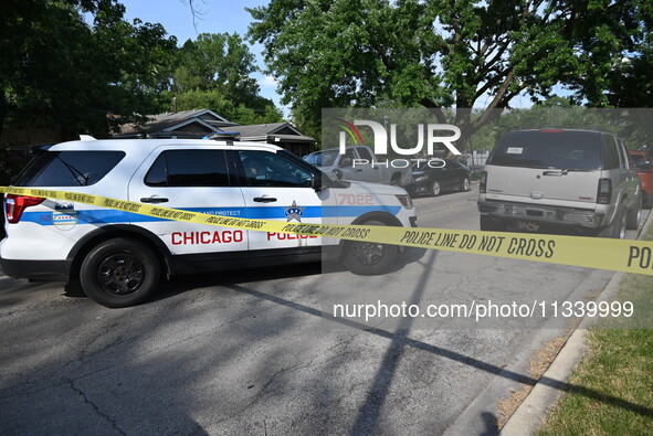 Chicago police are blocking off the area. Two people are being shot on S. Burnside Avenue in Chicago, Illinois, United States, on June 17, 2...