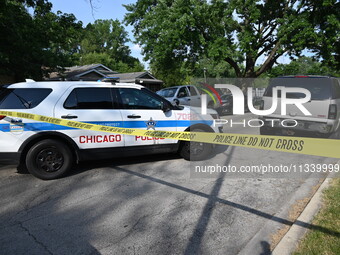 Chicago police are blocking off the area. Two people are being shot on S. Burnside Avenue in Chicago, Illinois, United States, on June 17, 2...