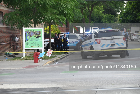 Chicago police are at the crime scene where two people are being shot, with one of the people shot being pronounced dead. One person is bein...