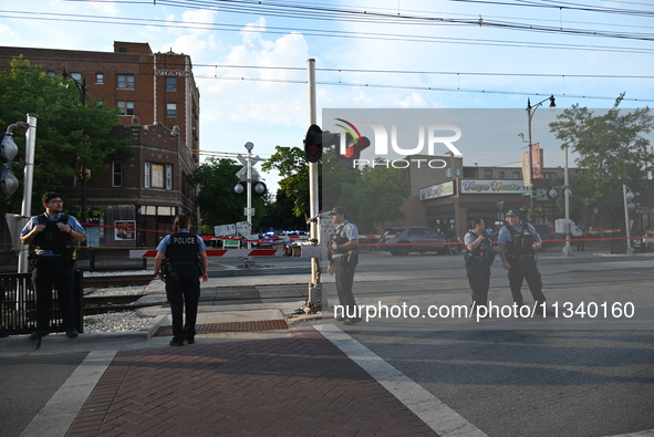 Chicago police are at the crime scene where two people are being shot, with one of the people shot being pronounced dead. One person is bein...