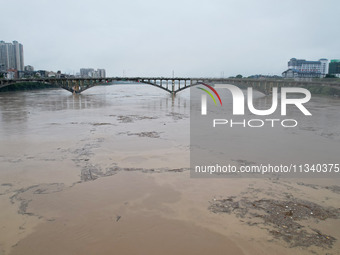 Floodwaters are passing through the Rongan county section of the Rongjiang River in the upper reaches of the Pearl River in Liuzhou, Guangxi...