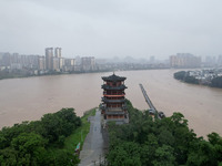 Floodwaters are passing through the Rongan county section of the Rongjiang River in the upper reaches of the Pearl River in Liuzhou, Guangxi...