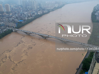 Floodwaters are passing through the Rongan county section of the Rongjiang River in the upper reaches of the Pearl River in Liuzhou, Guangxi...