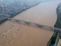 Floodwaters are passing through the Rongan county section of the Rongjiang River in the upper reaches of the Pearl River in Liuzhou, Guangxi...