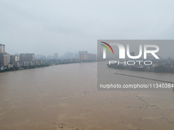 Floodwaters are passing through the Rongan county section of the Rongjiang River in the upper reaches of the Pearl River in Liuzhou, Guangxi...