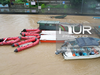 Floodwaters are passing through the Rongan county section of the Rongjiang River in the upper reaches of the Pearl River in Liuzhou, Guangxi...