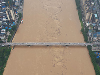 Floodwaters are passing through the Rongan county section of the Rongjiang River in the upper reaches of the Pearl River in Liuzhou, Guangxi...