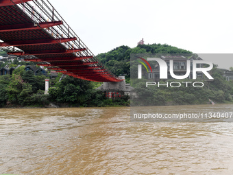 Water level is rising in the Maotai Township section of the Chishui River due to heavy rainfall in Renhuai, China, on June 18, 2024. (