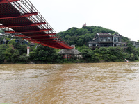 Water level is rising in the Maotai Township section of the Chishui River due to heavy rainfall in Renhuai, China, on June 18, 2024. (