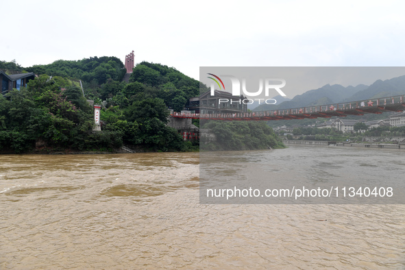 Water level is rising in the Maotai Township section of the Chishui River due to heavy rainfall in Renhuai, China, on June 18, 2024. 