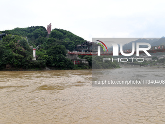 Water level is rising in the Maotai Township section of the Chishui River due to heavy rainfall in Renhuai, China, on June 18, 2024. (