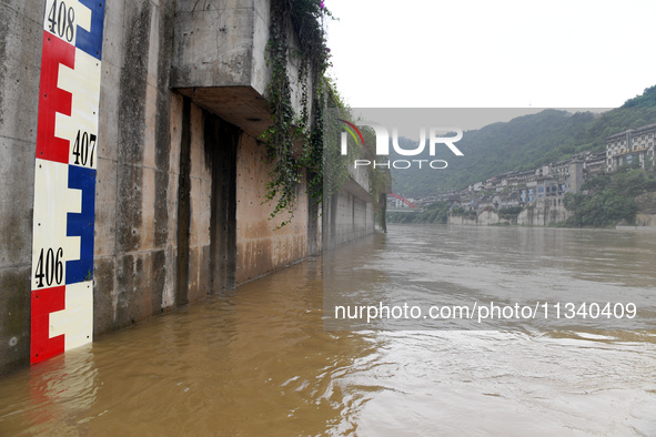 Water level is rising in the Maotai Township section of the Chishui River due to heavy rainfall in Renhuai, China, on June 18, 2024. 