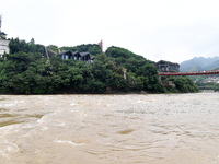 Water level is rising in the Maotai Township section of the Chishui River due to heavy rainfall in Renhuai, China, on June 18, 2024. (