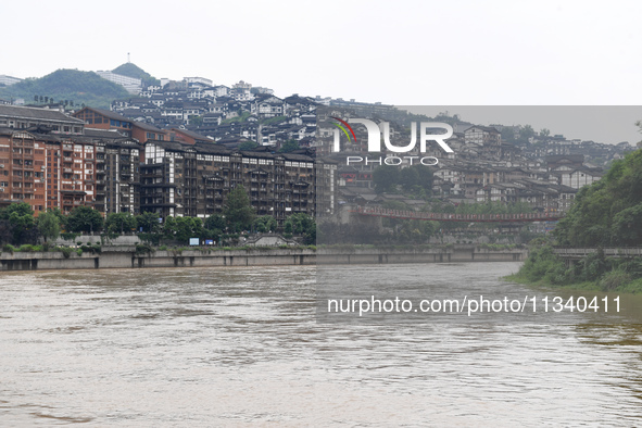 Water level is rising in the Maotai Township section of the Chishui River due to heavy rainfall in Renhuai, China, on June 18, 2024. 