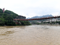 Water level is rising in the Maotai Township section of the Chishui River due to heavy rainfall in Renhuai, China, on June 18, 2024. (