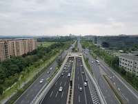 Vehicles are passing through the Wenyi West Road tunnel in Hangzhou, China, on June 18, 2024. (