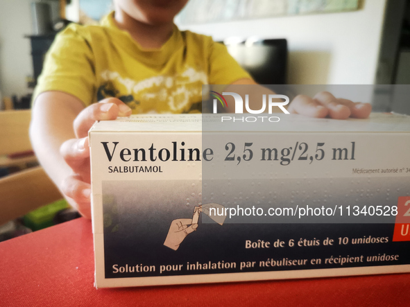 A child is holding a box of Ventolin in Paris, France, on June 18, 2024. Since the beginning of the month, Ventolin is in short supply in ma...