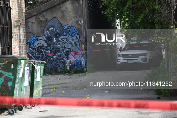 Shell casings are lying in an alley where the victim is being shot. A 48-year-old male is in critical condition after being shot in an alley...