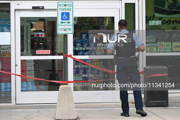 A 48-year-old male is walking into a Jewel Osco for help after being shot in an alley in Chicago, Illinois, United States, on June 18, 2024....