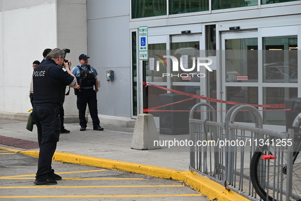 A 48-year-old male is walking into a Jewel Osco for help after being shot in an alley in Chicago, Illinois, United States, on June 18, 2024....