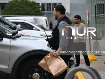 The police are taking out evidence bags at Jewel Osco where the victim who was shot is walking in for help. A 48-year-old male is in critica...