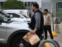 The police are taking out evidence bags at Jewel Osco where the victim who was shot is walking in for help. A 48-year-old male is in critica...