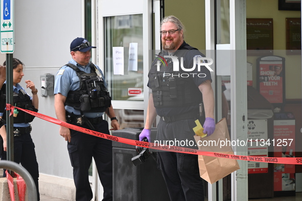 The police are taking out evidence bags at Jewel Osco where the victim who was shot is walking in for help. A 48-year-old male is in critica...