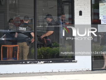 FBI agents are responding to PNC Bank because of a bank robbery in Chicago, Illinois. Two suspects are being captured, and money and a handg...