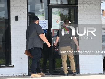 FBI agents are responding to PNC Bank because of a bank robbery in Chicago, Illinois. Two suspects are being captured, and money and a handg...