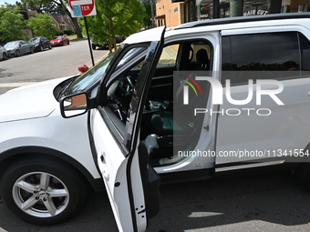 Two suspects are robbing PNC Bank at gunpoint and walking away with money in Chicago, Illinois, United States, on June 18, 2024. Around 9:50...