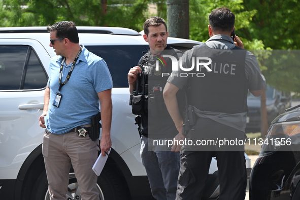 FBI agents and Chicago Police are responding to the scene on W. Belmont Ave. where two vehicles are being recovered that were used in the ba...