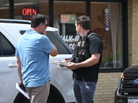 FBI agents and Chicago Police are responding to the scene on W. Belmont Ave. where two vehicles are being recovered that were used in the ba...