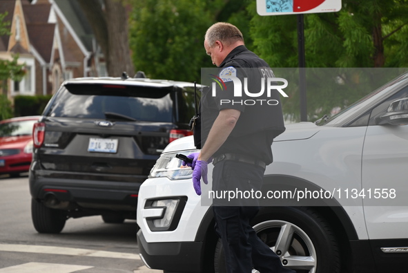 The Crime Scene Unit is recovering a handgun from a vehicle used in the bank robbery. Two suspects are being captured, and money and a handg...