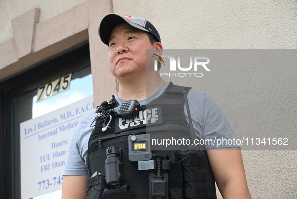 An FBI agent is at the scene on W. Belmont Ave. where two vehicles are being recovered that were used in the bank robbery. Two suspects are...