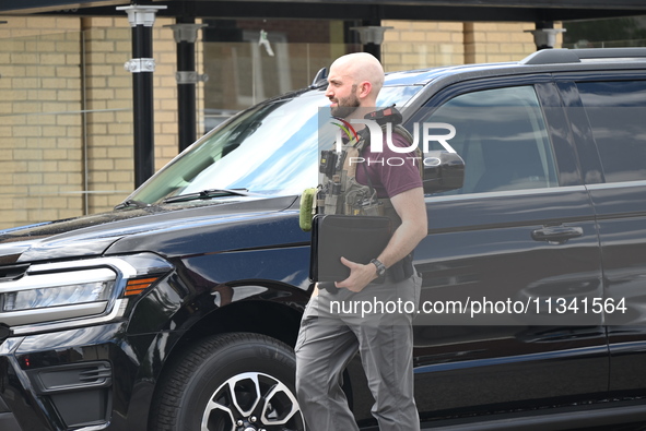 An FBI agent is at the scene on W. Belmont Ave. where two vehicles are being recovered that were used in the bank robbery. Two suspects are...